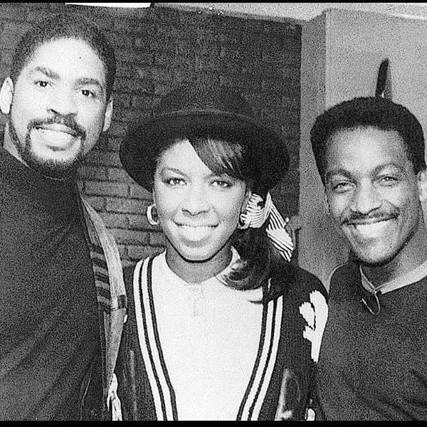 Donnie pictured with Miles Jaye (l) and Natalie Cole (center).